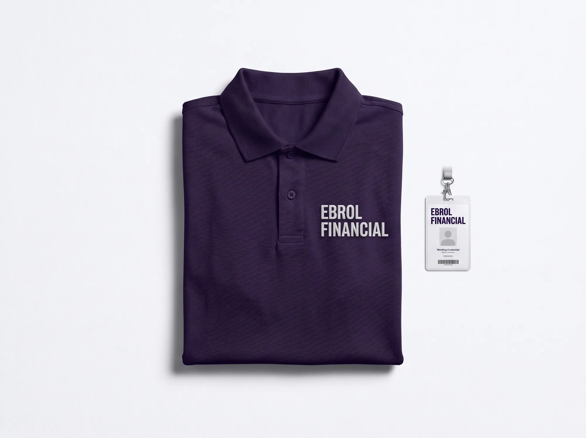 Ebrol Financial Practitioner Polo (Apparel) — A working financial-services-deployment field-engineer polo — deep violet (#2A1240) cotton-pique with EBROL FINANCIAL embroidered in cool near-white (#FAFAFB) Space Grotesk bold caps above the heart.